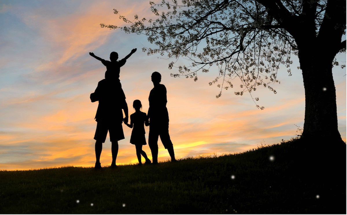 A family together beneath a tree